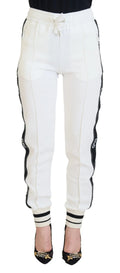 Dolce & Gabbana white dg logo sweatpants with black side stripes ribbed cuffs and drawstring waistband