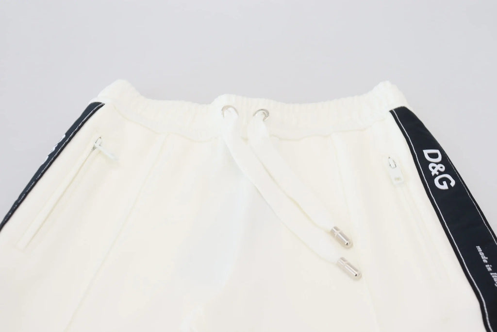 Dolce gabbana white dg logo sweatpants with black side stripes and silver toned drawstring hardware