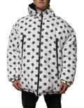 Veste matelassée dolce & gabbana blanche avec motif monogramme dc noir répétitif et capuche