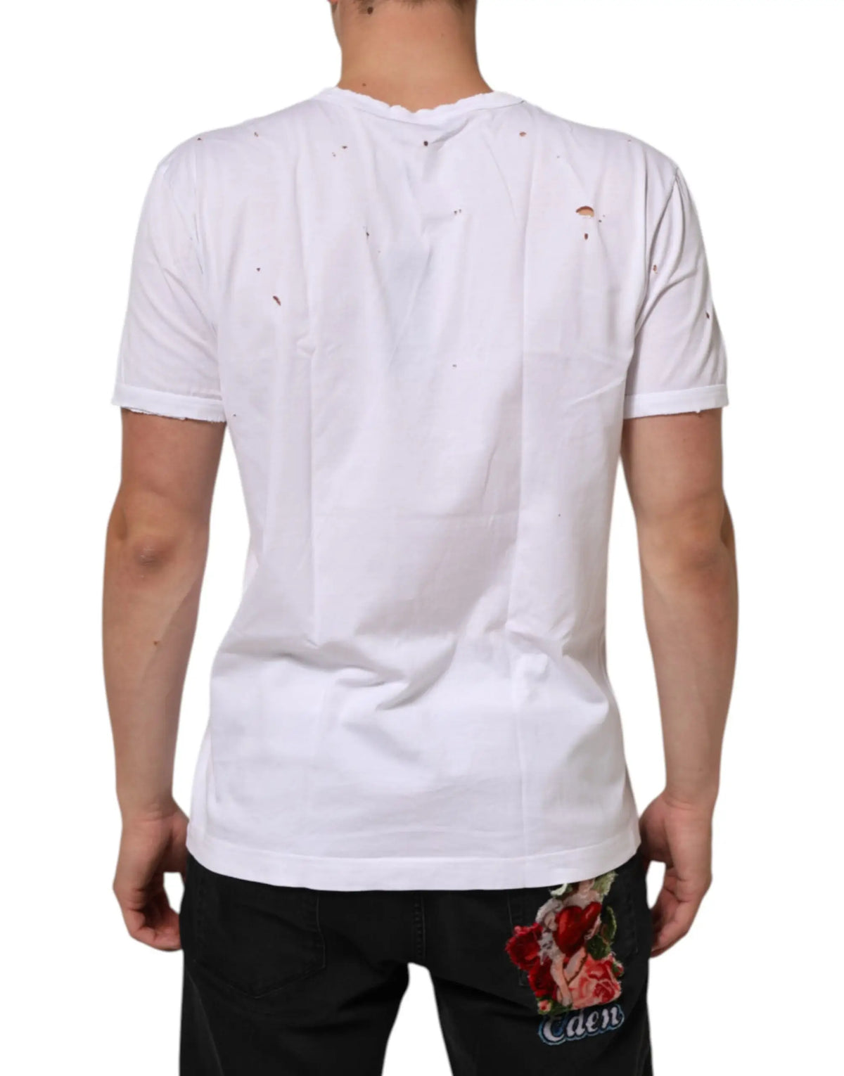 Dolce & gabbana t-shirt homme blanc en coton distressed avec léger effet tacheté noir et petite déchirure à l’épaule