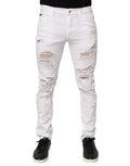 Dolce & gabbana jean en denim blanc déchiré à coupe slim avec genoux déchirés