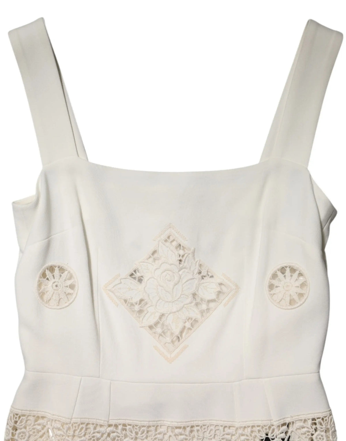 Top blanc sans manches dolce gabbana en dentelle florale avec broderies délicates et embellissements circulaires sur les côtés