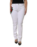 Jean en denim blanc dolce & gabbana avec broderie fleurie rouge et feuilles vertes sur la cuisse
