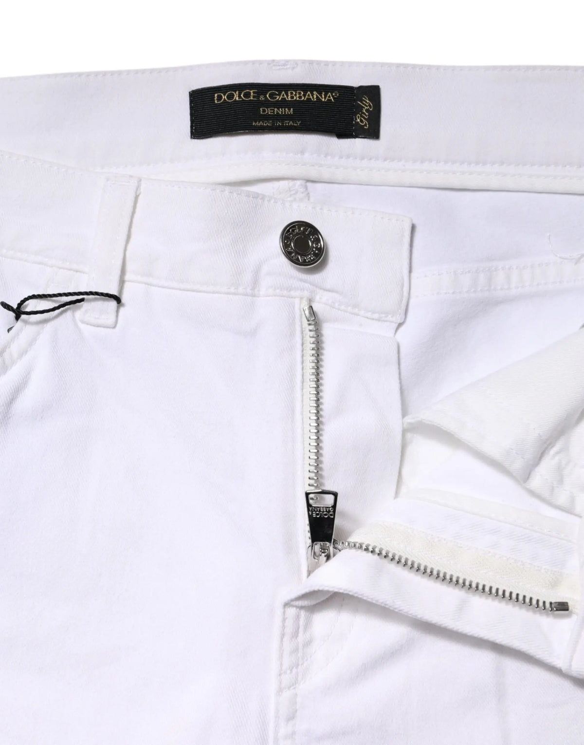Jean en denim blanc dolce & gabbana girly avec étiquette noire et zip argenté fermé par bouton