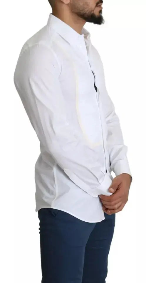 Chemise blanche formelle dolce & gabbana en tissu repassé avec col classique et boutons sur le devant