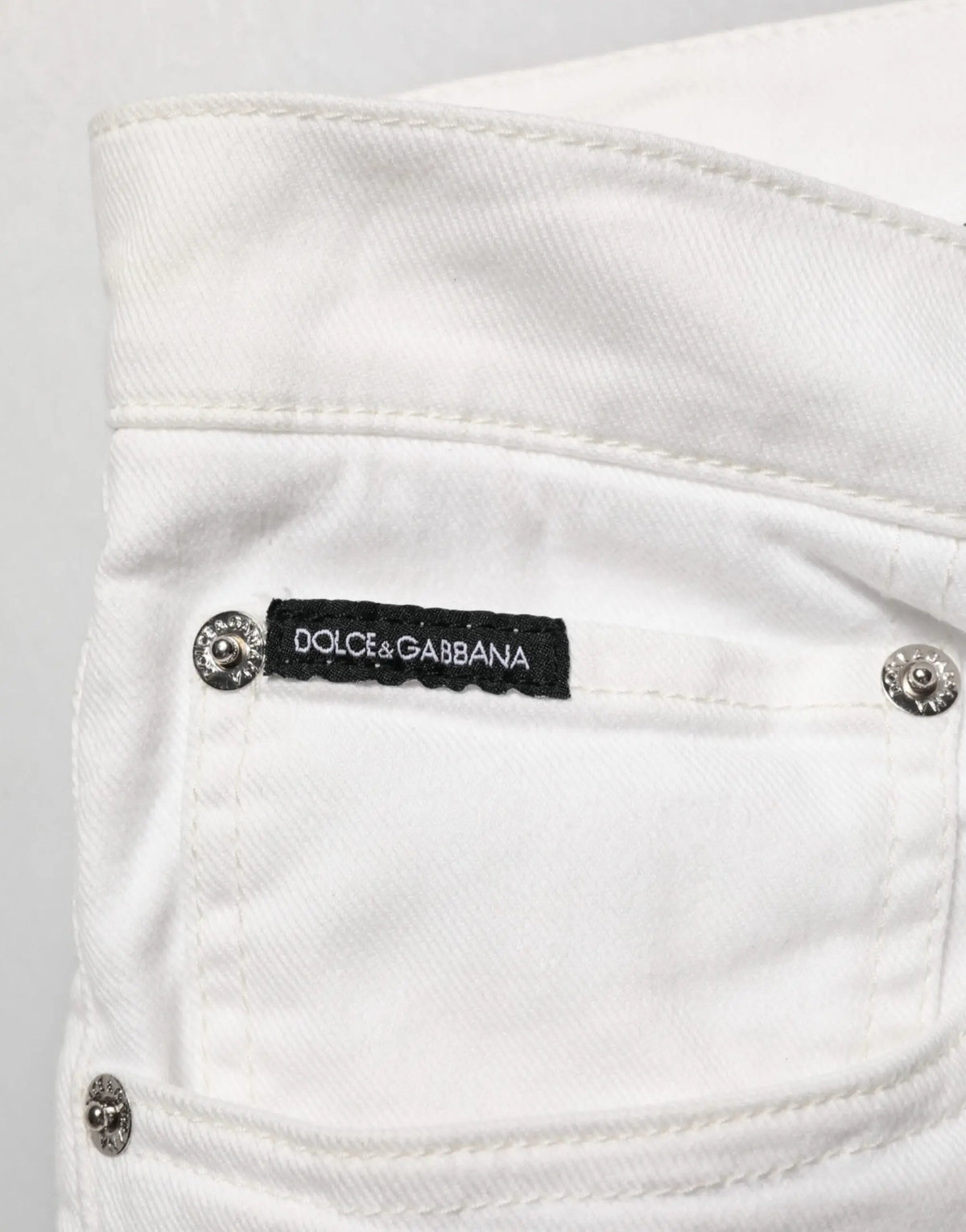Jean skinny blanc dolce gabbana en denim gold avec étiquette noire et boutons métalliques argentés