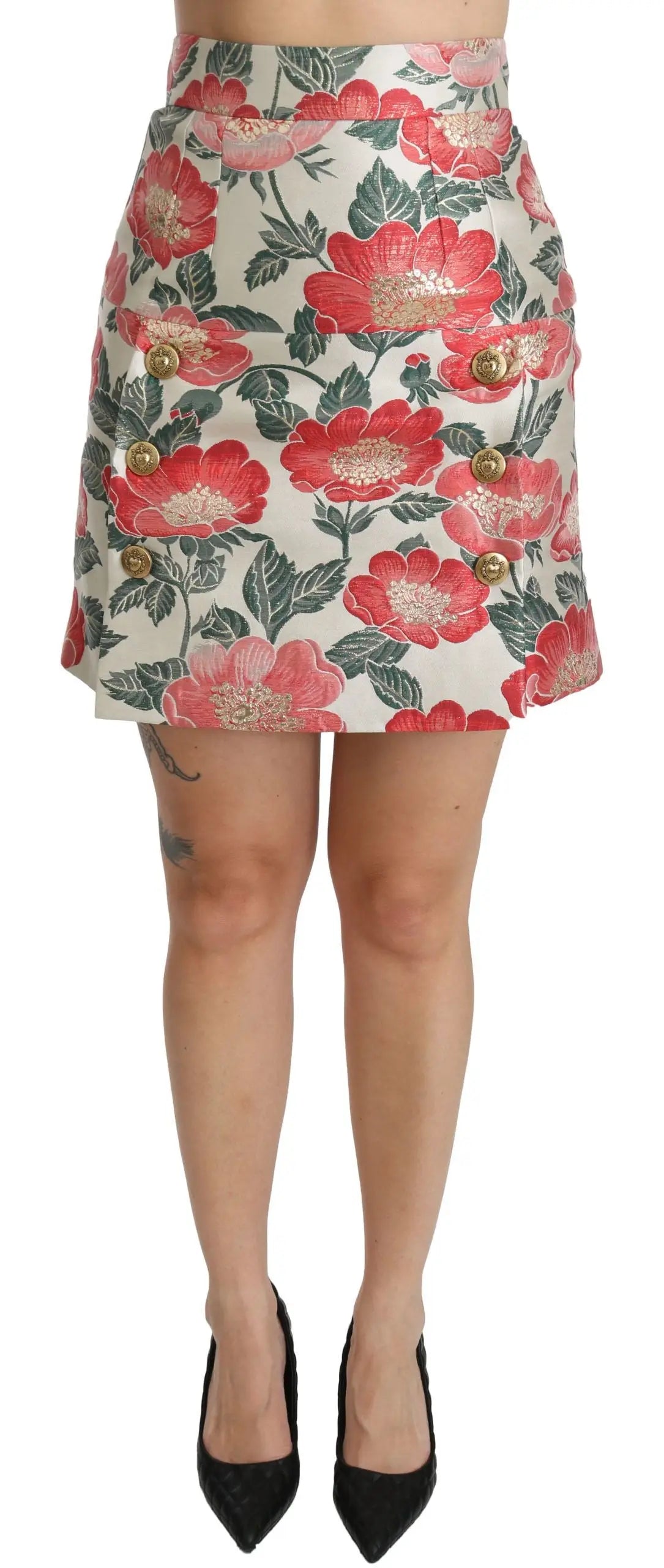 Dolce & Gabbana jupe mini taille haute blanche avec motif floral rouge et vert et boutons dorés sur le devant