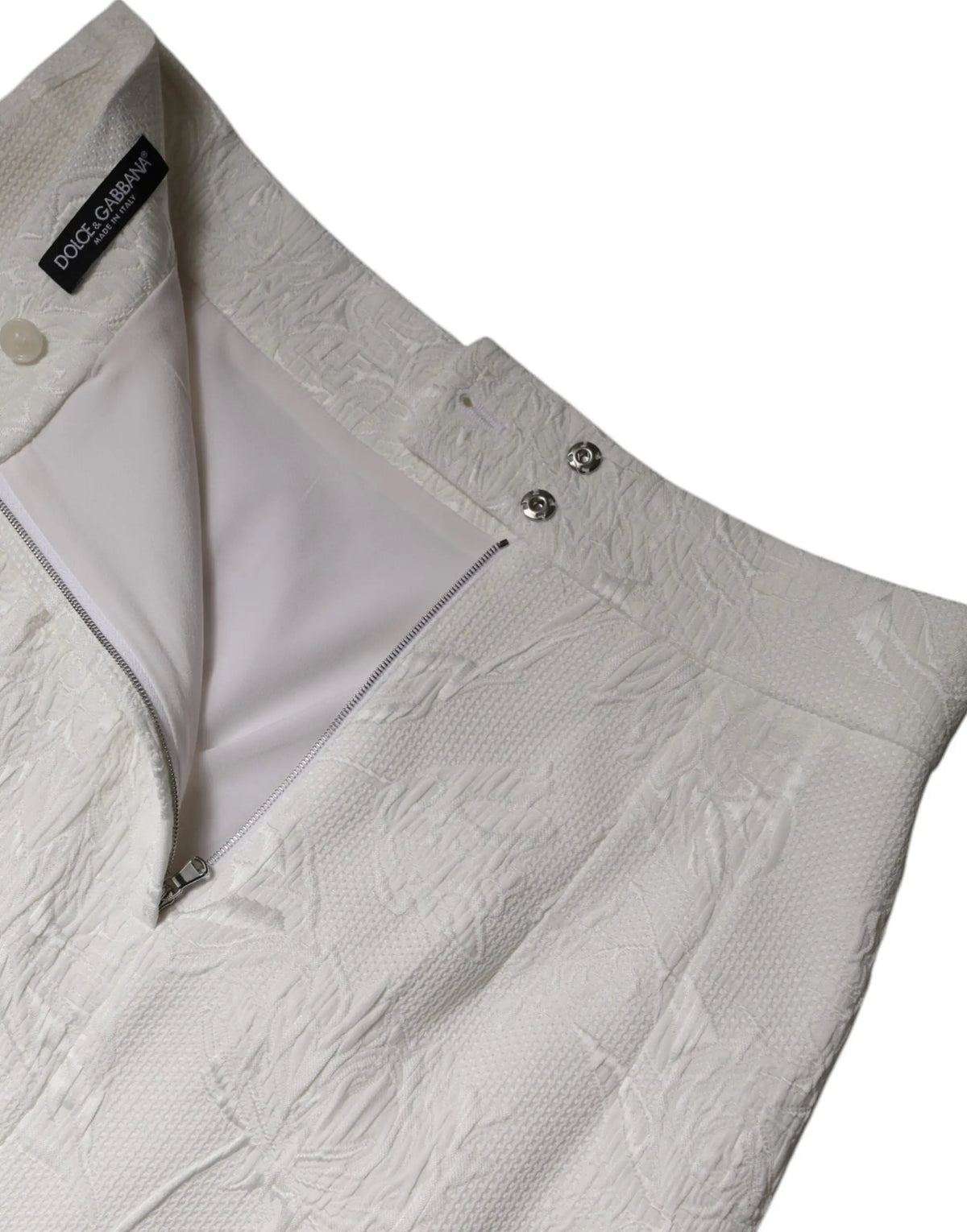 Jupe crayon blanche dolce gabbana en tissu texturé avec motif embossé subtil et boutons métalliques argentés