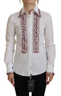 Chemise blanche dolce gabbana à boutons avec broderie bordeaux détaillée sur la patte de boutonnage col et poignets