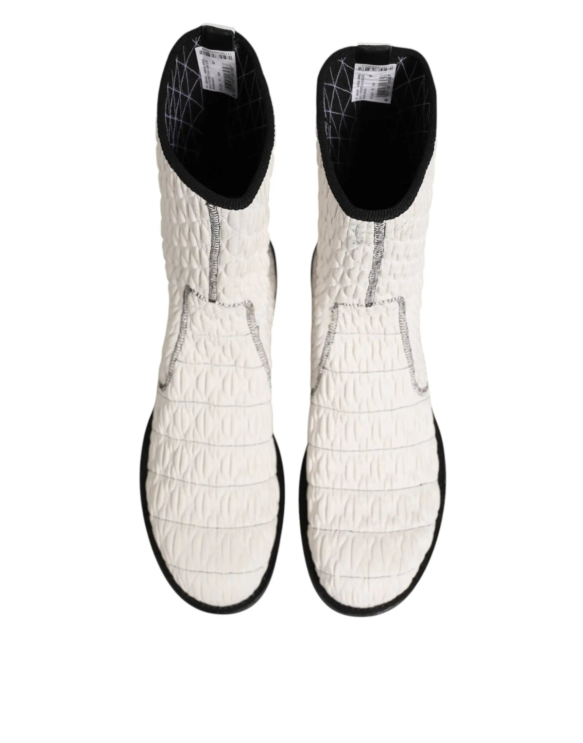 Bottes mi-mollet dolce & gabbana en cuir dagneau blanc matelassé avec bordure noire et logo nike argent subtil
