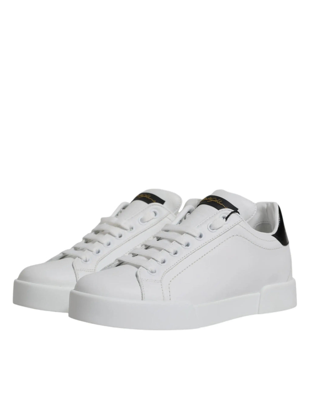 Baskets basses classiques dolce & gabbana en cuir blanc avec accents noirs au talon et à la languette