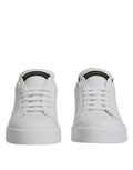 Dolce & gabbana baskets basses classiques en cuir blanc avec design minimaliste et logo doré subtil au talon