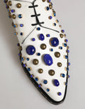 Dolce & gabbana chaussures habillées en cuir blanc ornées de pierres de lapis lazuli bleues et clous dorés