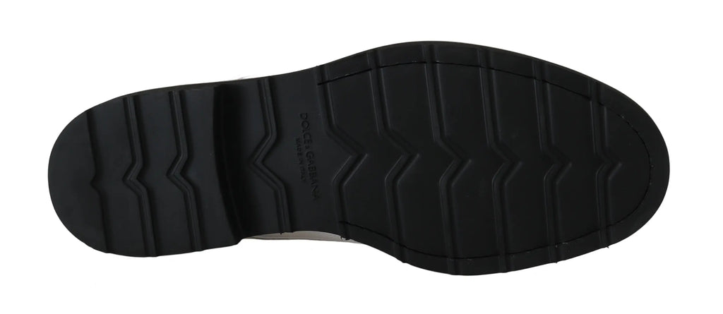 Semelle extérieure en caoutchouc noir texturée avec motif ondulé et logo embossé dolce gabbana pour derby blanc en cuir