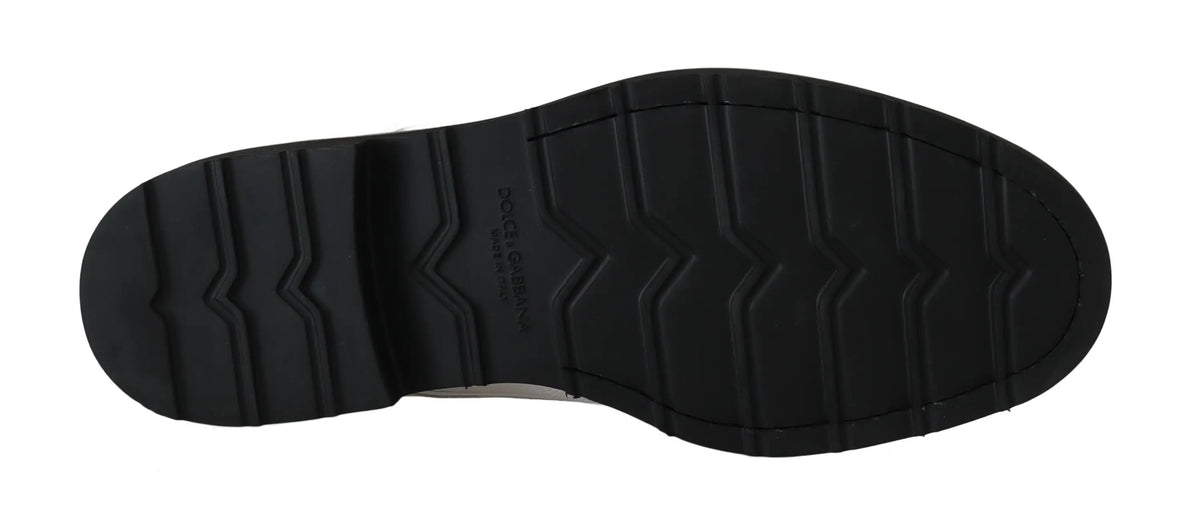 Semelle extérieure en caoutchouc noir texturée avec motif ondulé et logo embossé dolce gabbana pour derby blanc en cuir