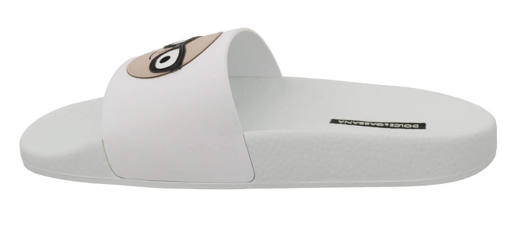 Dolce & gabbana white leather slide sandal with beige cartoon eye design on the strap for casual wear