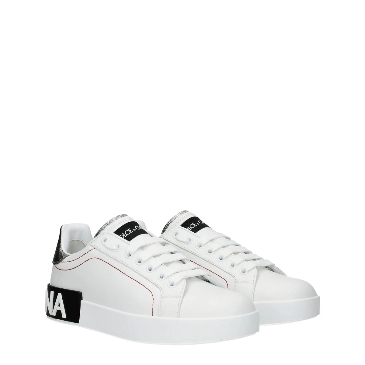 Dolce & gabbana baskets basses en cuir blanc avec accents noirs et couture rouge