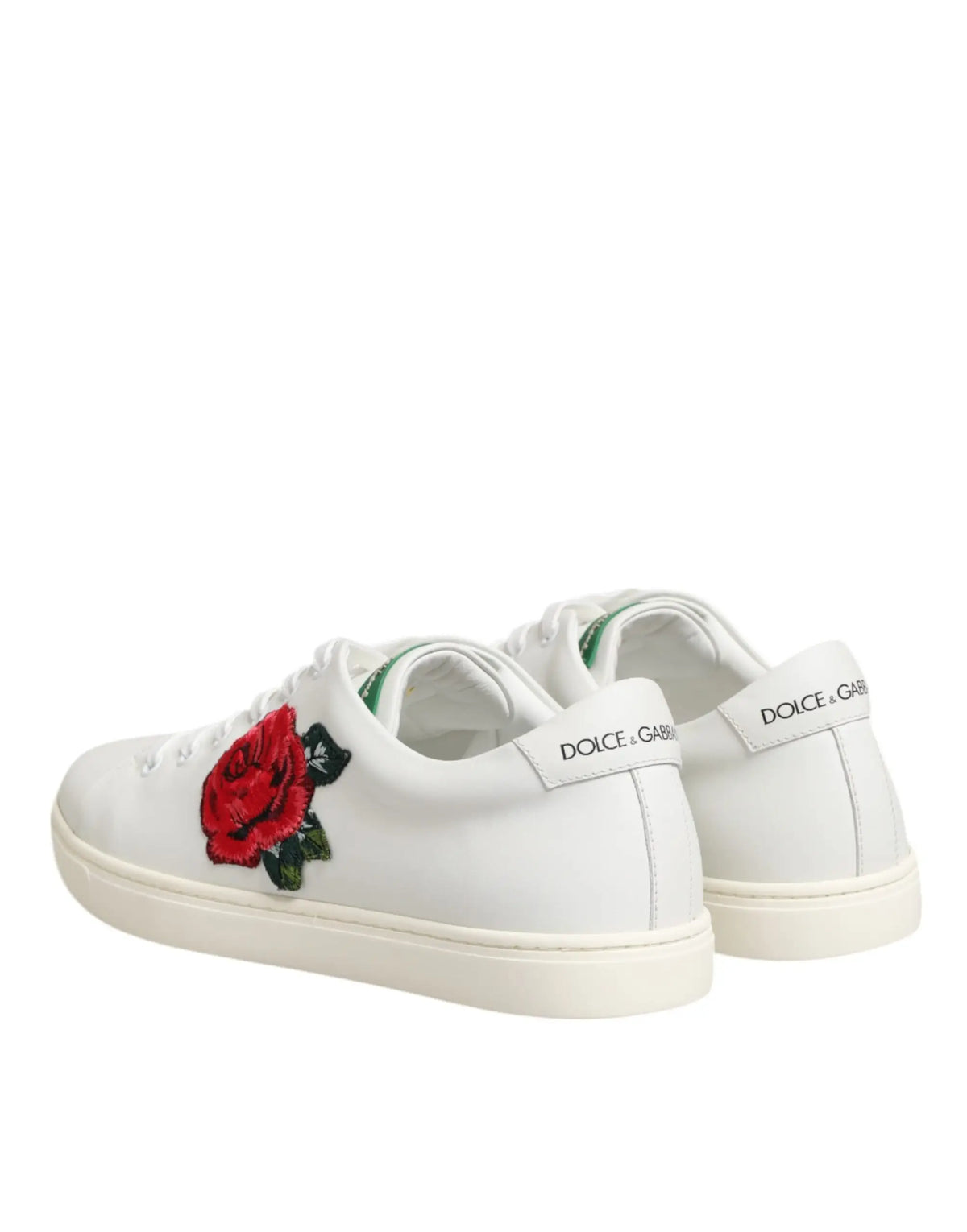 Dolce & gabbana baskets basses blanches en cuir avec broderie rose rouge vive sur le côté