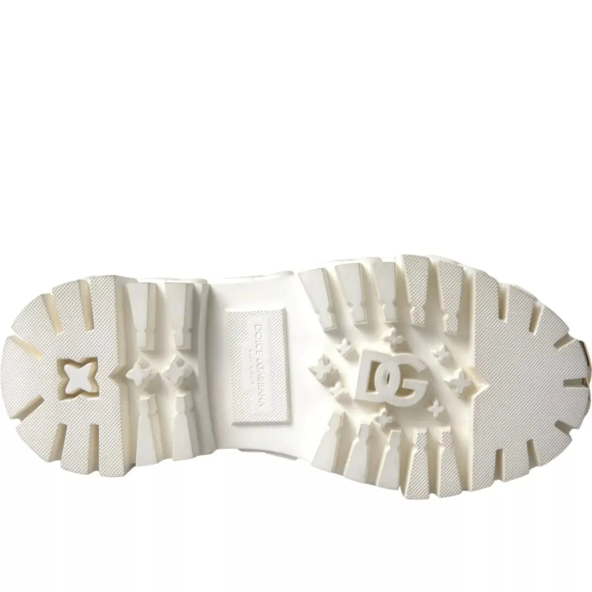 Semelle en caoutchouc blanche avec logo dc shoes embossé et motif de traction texturé sur bottines dolce gabbana cuir blanc