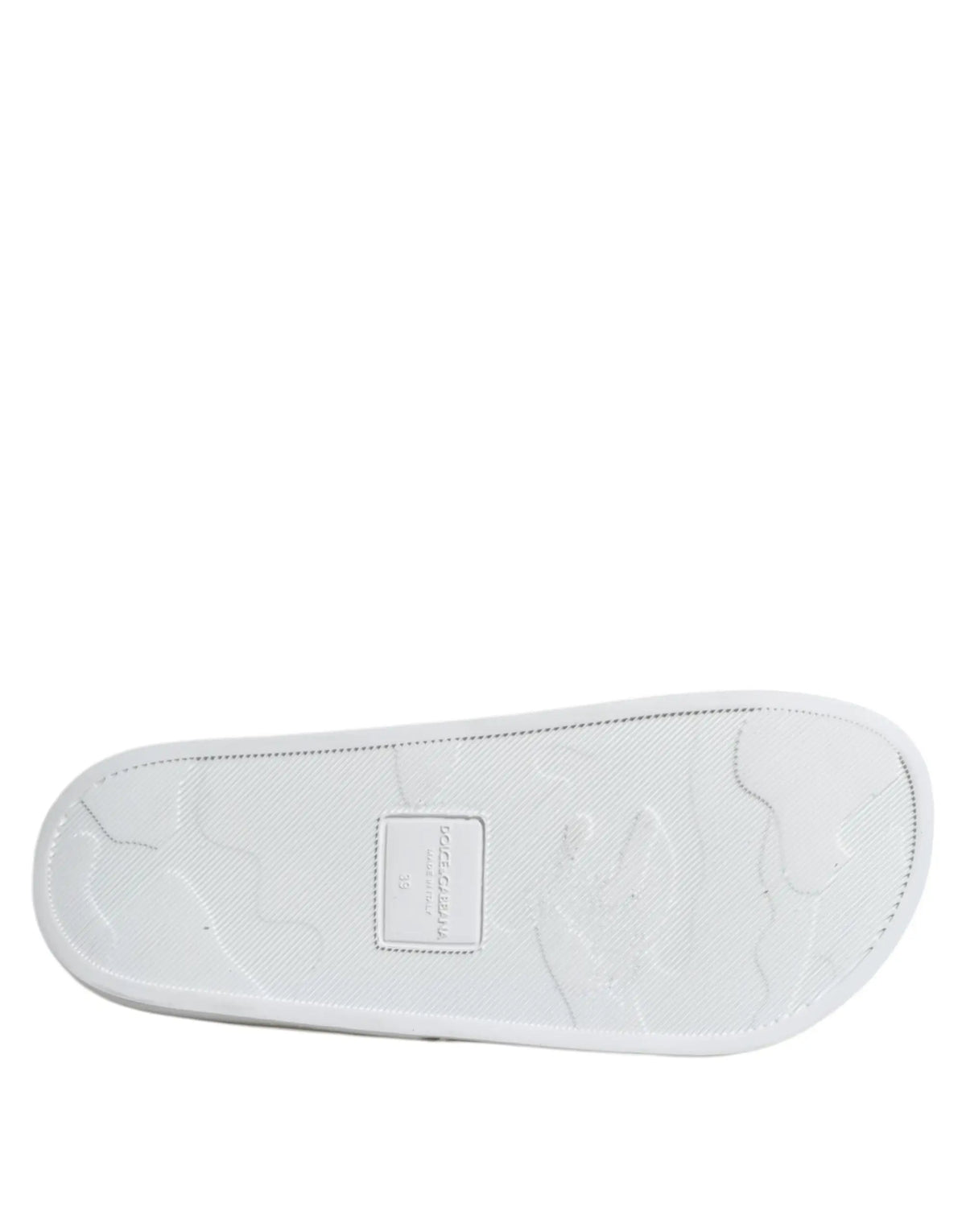 Sandales slides dolce & gabbana en cuir blanc avec motif embossé pour plage et label rectangulaire sur la semelle