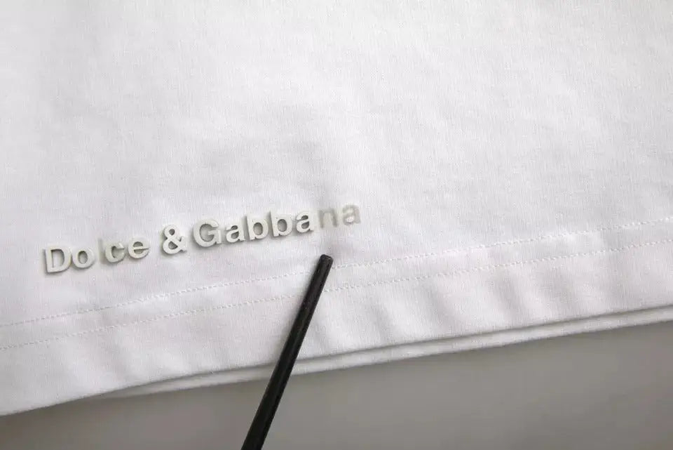 T-shirt blanc dolce gabbana en coton avec logo brodé en fil argenté sur le devant