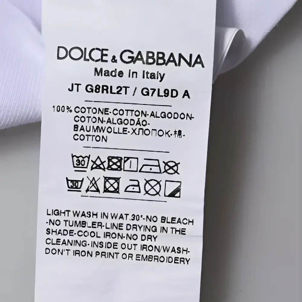 Étiquette d entretien en coton du t shirt dolce gabbana blanc avec logo imprimé col rond en coton