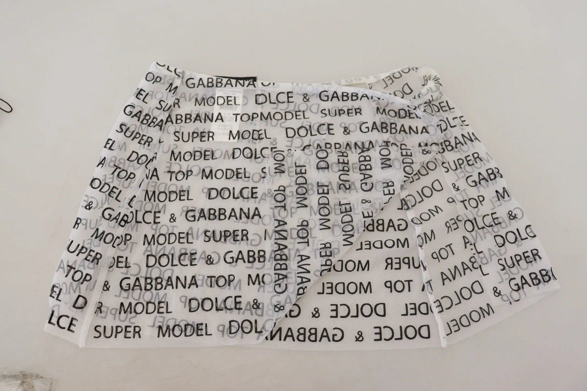 Short blanc dolce & gabbana avec imprimé répétitif noir dolce & gabbana et super model transparent en ligne a forme mini jupe