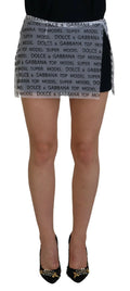 Mini-jupe a ligne blanche transparente dolce gabbana avec motif logo dolce gabbana en noir et blanc
