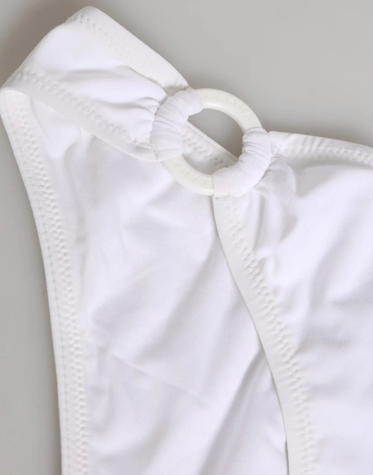 Dolce & gabbana white logo swimsuit top with circular plastic ring detail in white fabric bikini style