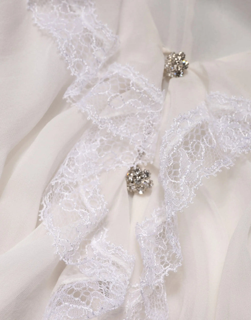 Blouse blanche dolce & gabbana à manches longues en dentelle avec ornements floraux argentés scintillants