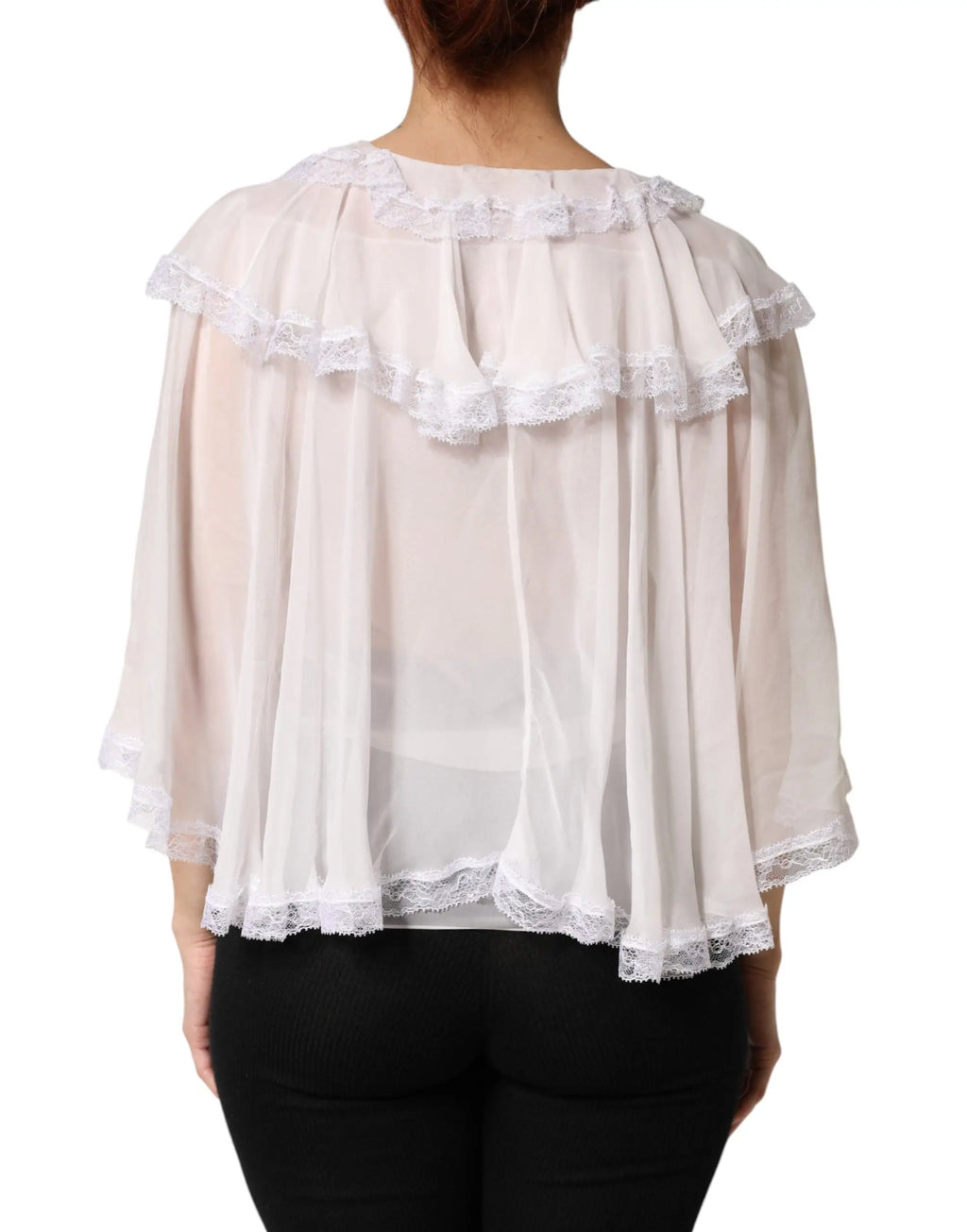 Blouse blanche dolce & gabbana en dentelle semi-transparente avec volants superposés au col et à l’ourlet
