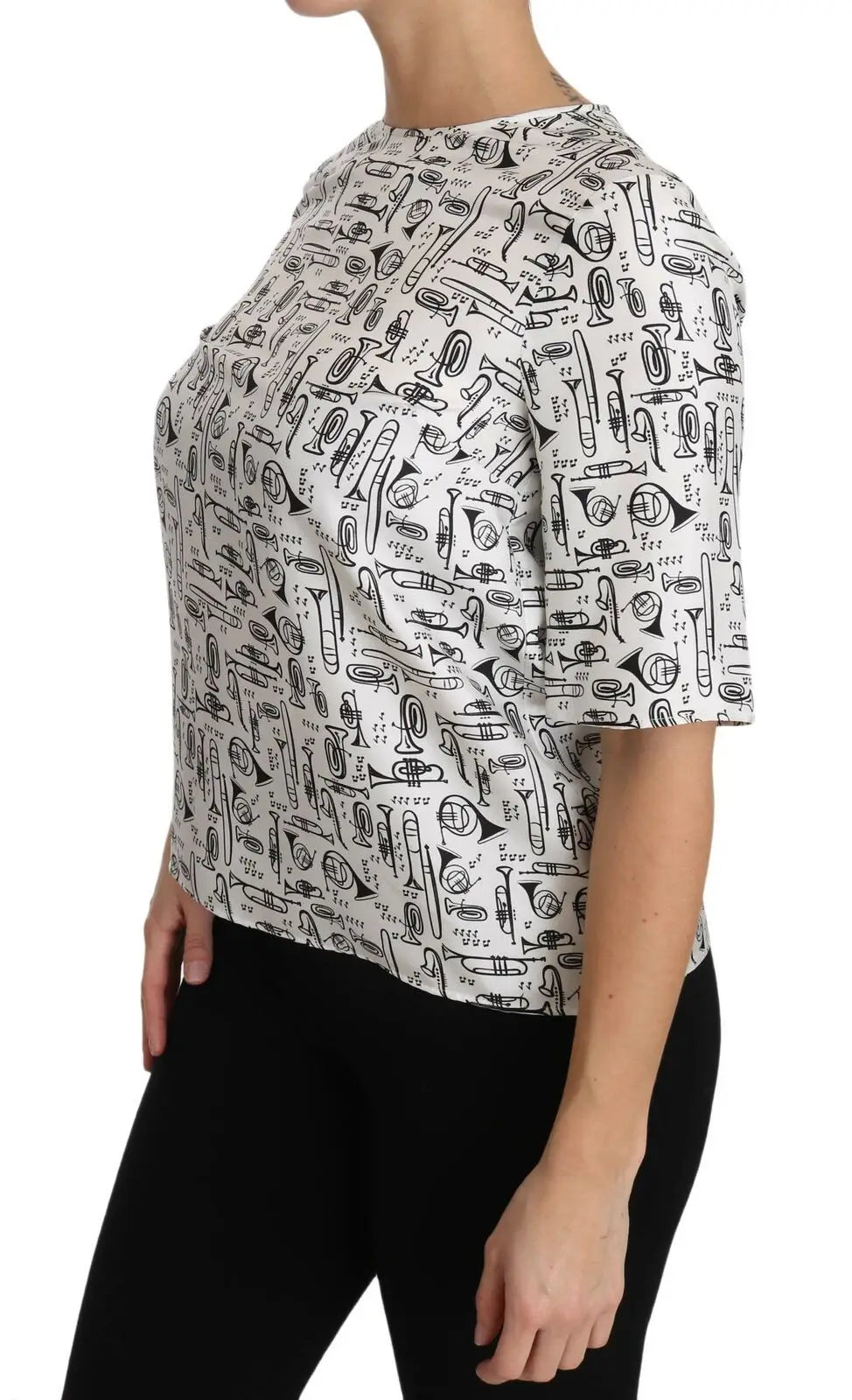 Blouse blanche dolce & gabbana à manches courtes avec imprimé noir d’instruments de musique variés