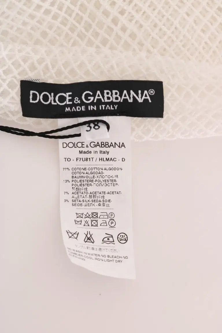 Étiquette d entretien dolce & gabbana sur tissu texturé du dos du débardeur transparent en filet blanc