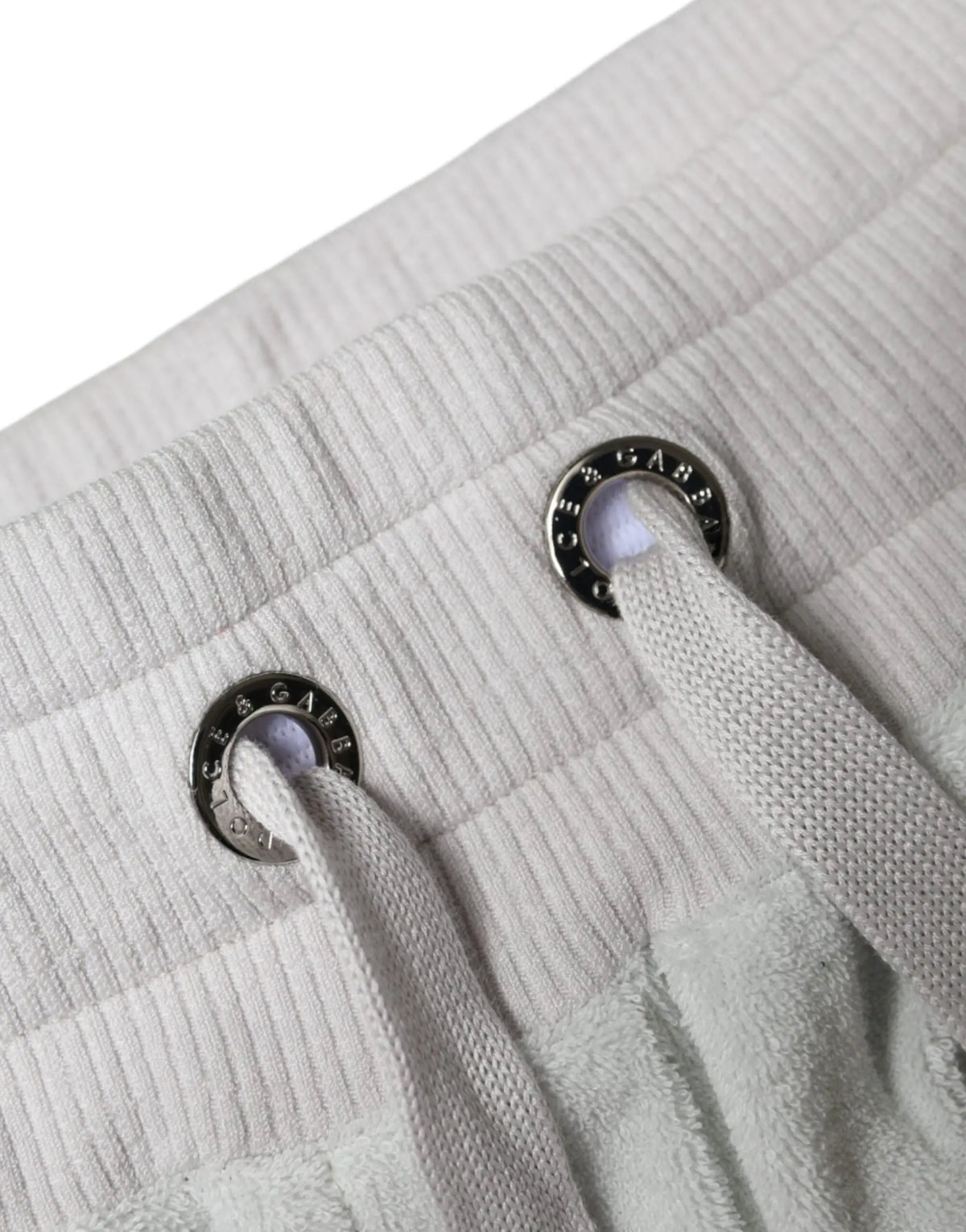 Pantalon de jogging blanc dolce & gabbana en nylon avec cordon et œillets métalliques argentés gravés du logo