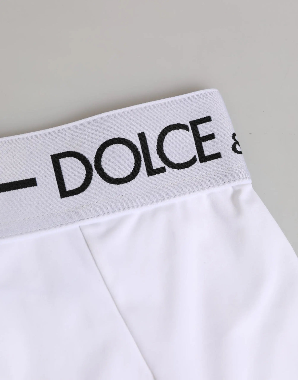 Culotte de marque dolce gabbana en nylon blanc avec ceinture élastique noire et logo visible