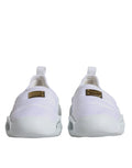 Baskets basses dolce & gabbana blanches en tissu matelassé avec design moderne et plaque de marque dorée sur le côté