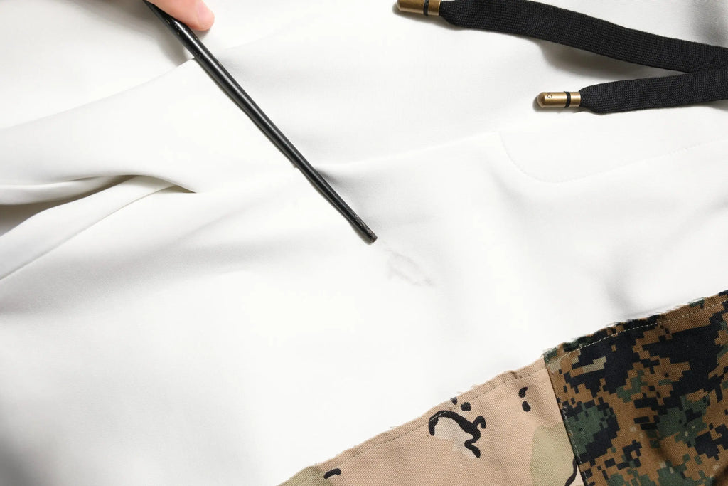 Dolce & gabbana white patchwork mens jogger pants with white hoodie featuring black drawstrings and camouflage patch
