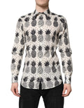 Chemise boutonnée manches longues dolce & gabbana blanche motif ananas noir et blanc avec texture subtile à pois
