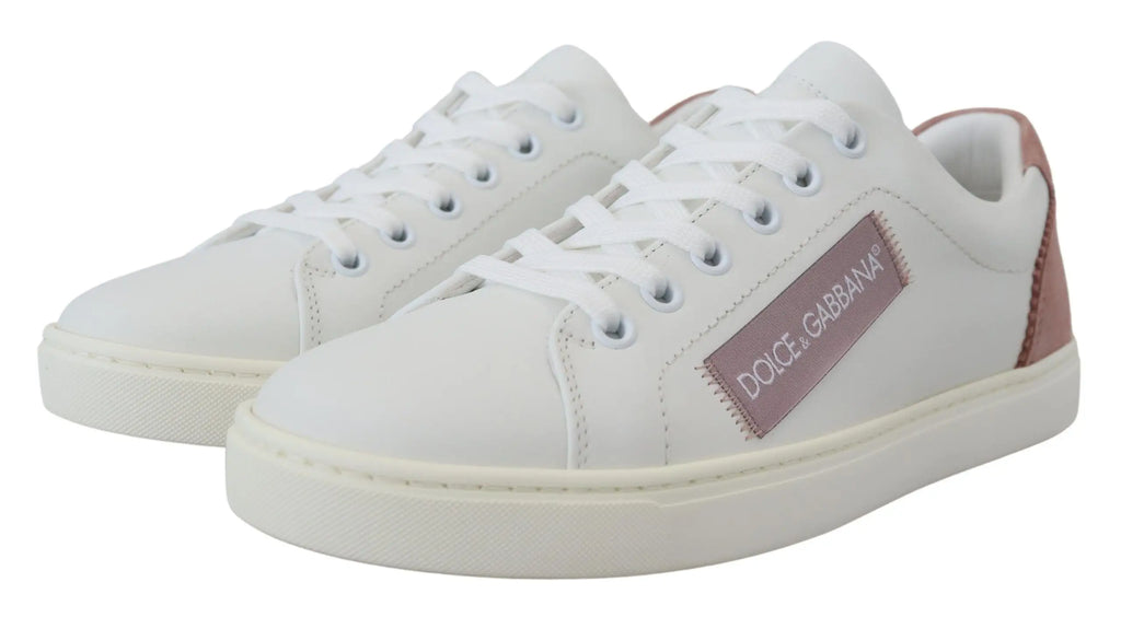 Baskets basses dolce et gabbana blanches en cuir rose avec accents or rose et design minimaliste élégant