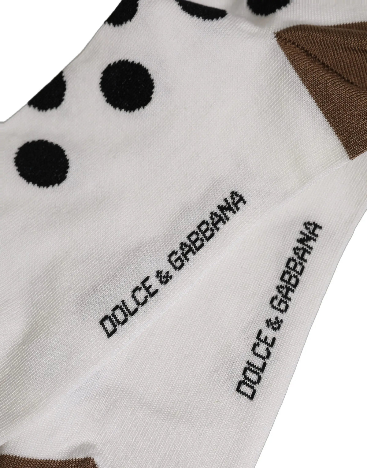 Chaussettes dolce & gabbana blanches à pois noirs avec talon marron accessoire au-dessus du mollet