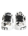 Baskets dolce gabbana portofino blanches avec lacets noirs, cristaux scintillants et graphismes noirs audacieux