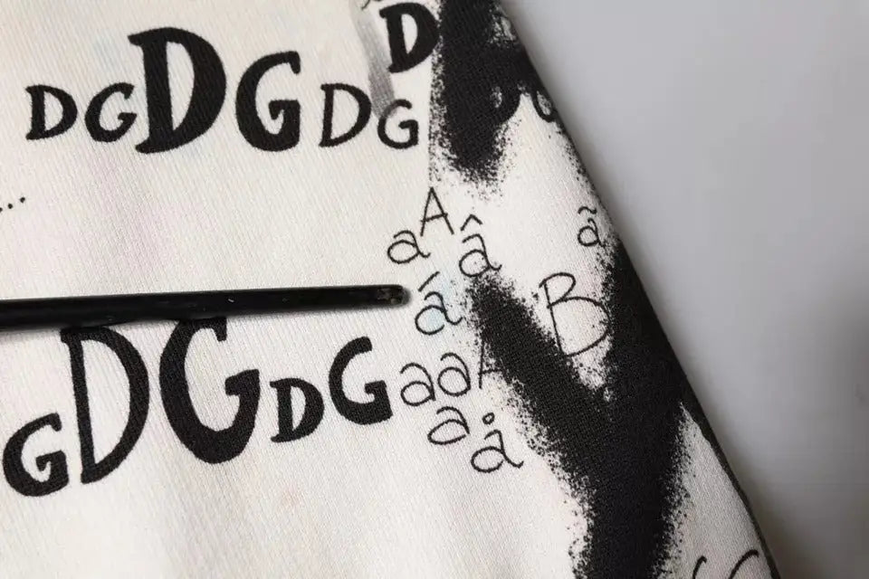 Pantalon de jogging en coton blanc dolce & gabbana avec imprimé lettres majuscules et caractères accentués stylisés
