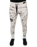 Dolce & gabbana white printed cotton jogger sweatpants with bold black graphic print and black drawstrings