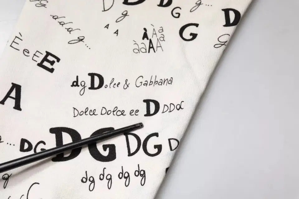 Sac fourre-tout en coton blanc avec imprimé typographique noir dolce gabbana assorti au pantalon jogger imprimé
