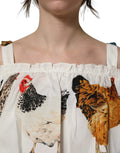Dolce & gabbana top en popeline blanc épaules dénudées avec imprimé ludique de poules colorées variées