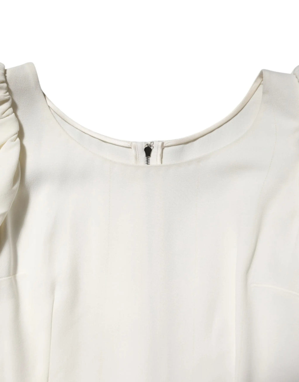 Blouse dolce & gabbana blanche encolure ronde manches courtes avec épaules à volants et fermeture zippée centrale