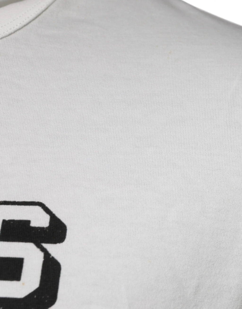 T-shirt blanc dolce & gabbana en coton avec un grand s noir graphique sur le devant