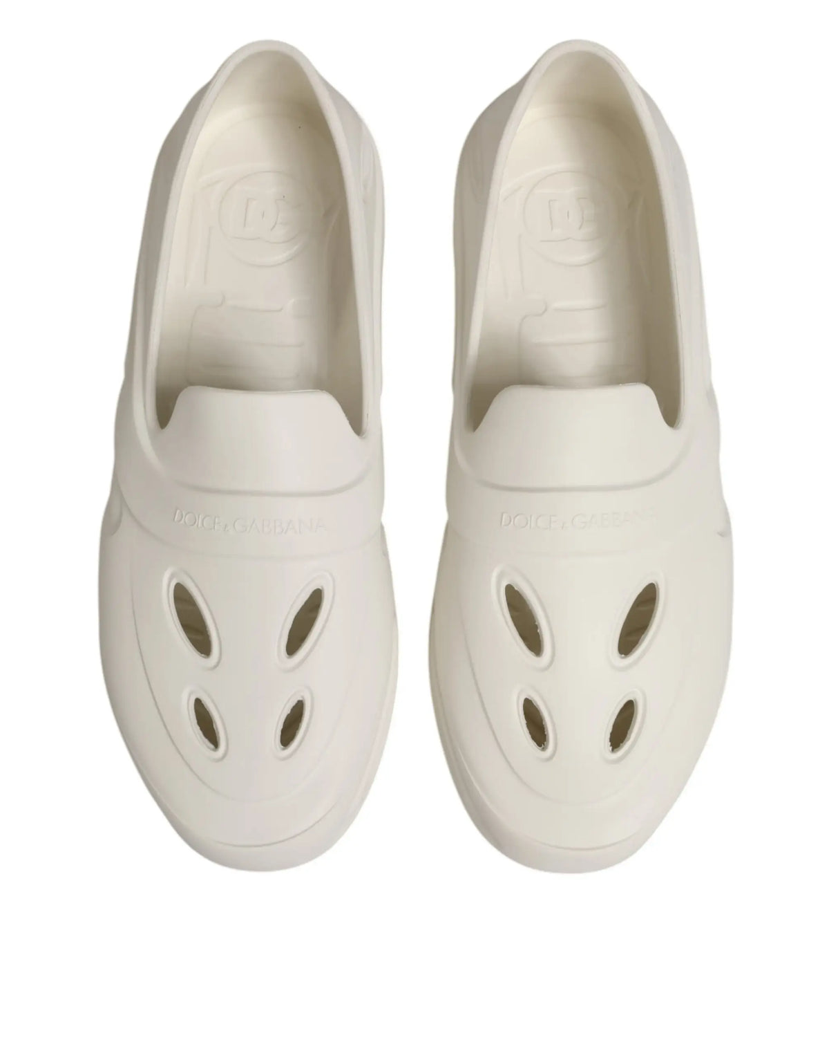 Clogs crème dolce & gabbana en caoutchouc blanc à enfiler avec découpes ovales sur le devant