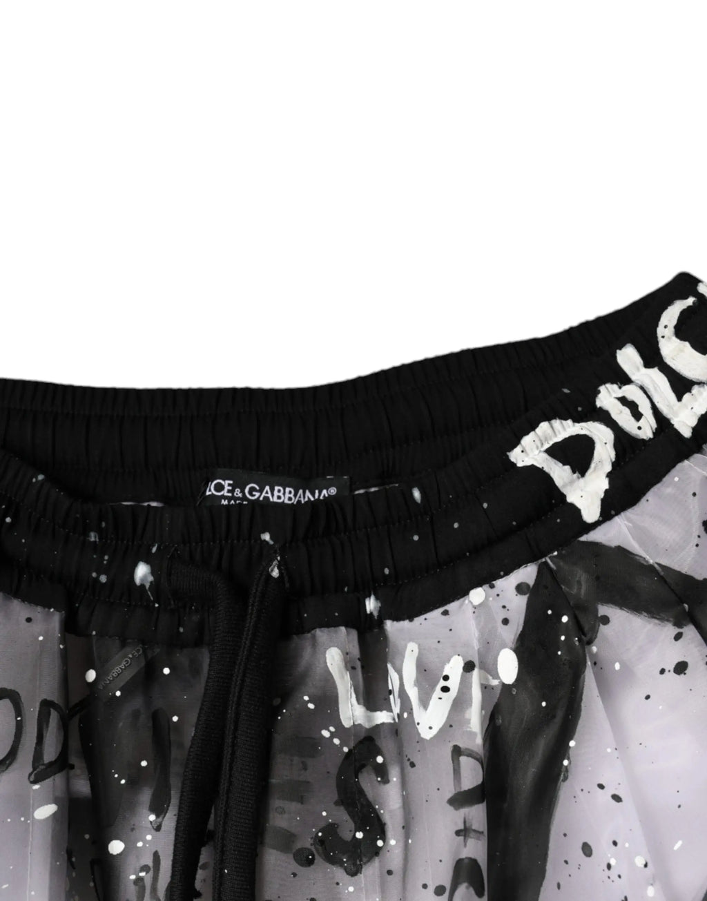 Jupe dolce gabbana imprimée noir et blanc avec taille élastique assortie au pantalon cargo blanc transparent logo croppé
