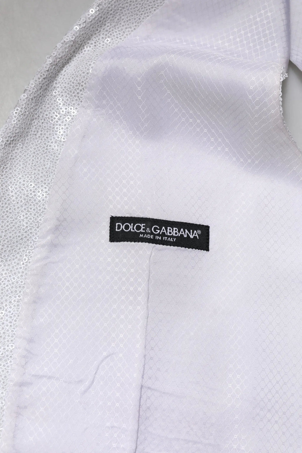 Dolce & gabbana gilet blanc avec bordure brillante en sequins argentés pour un look formel
